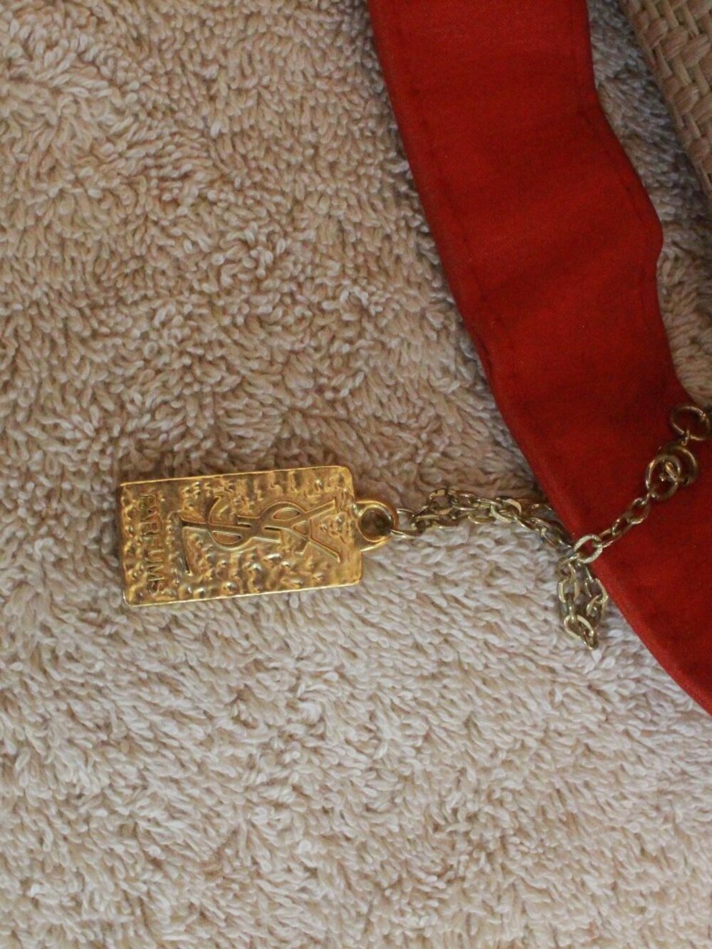 Title: Yves Saint Laurent Parfums Woven Tote with Red Trim